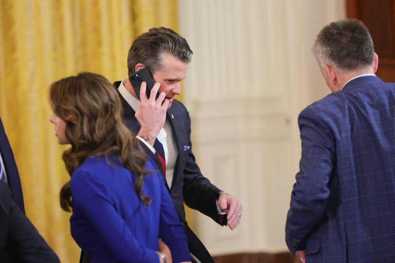 U.S. Secretary of Defense Pete Hegseth takes a phone call before a press conference with U.S. President Donald Trump and Israeli Prime Minister Benjamin Netanyahu at the White House in Washington, D.C. on February 4, 2025. (Photo by Bryan Dozier / Middle East Images / Middle East Images via AFP)