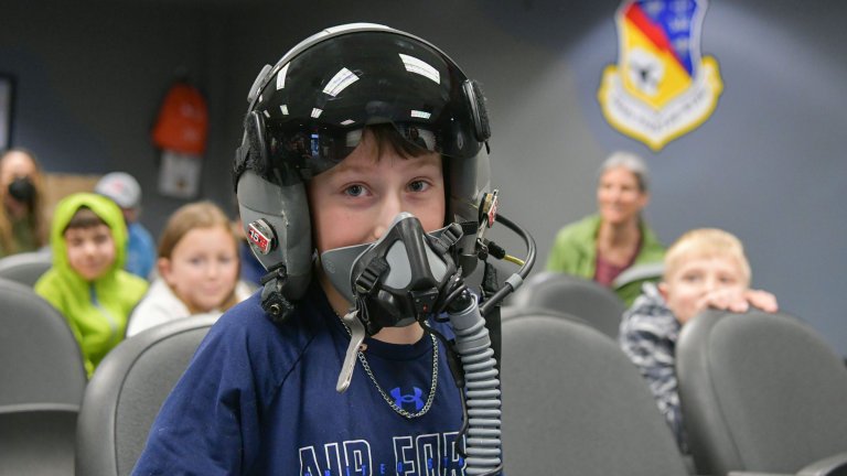 North Providence High School JROTC cadets and students from a homeschool group in Connecticut tour the 104th Fighter Wing, April 12, 2024, at Barnes Air National Guard Base, Massachusetts. Base tours give community members the opportunity to learn more about the 104FW mission and find out more about potential future careers within the Air Force and Air National Guard.