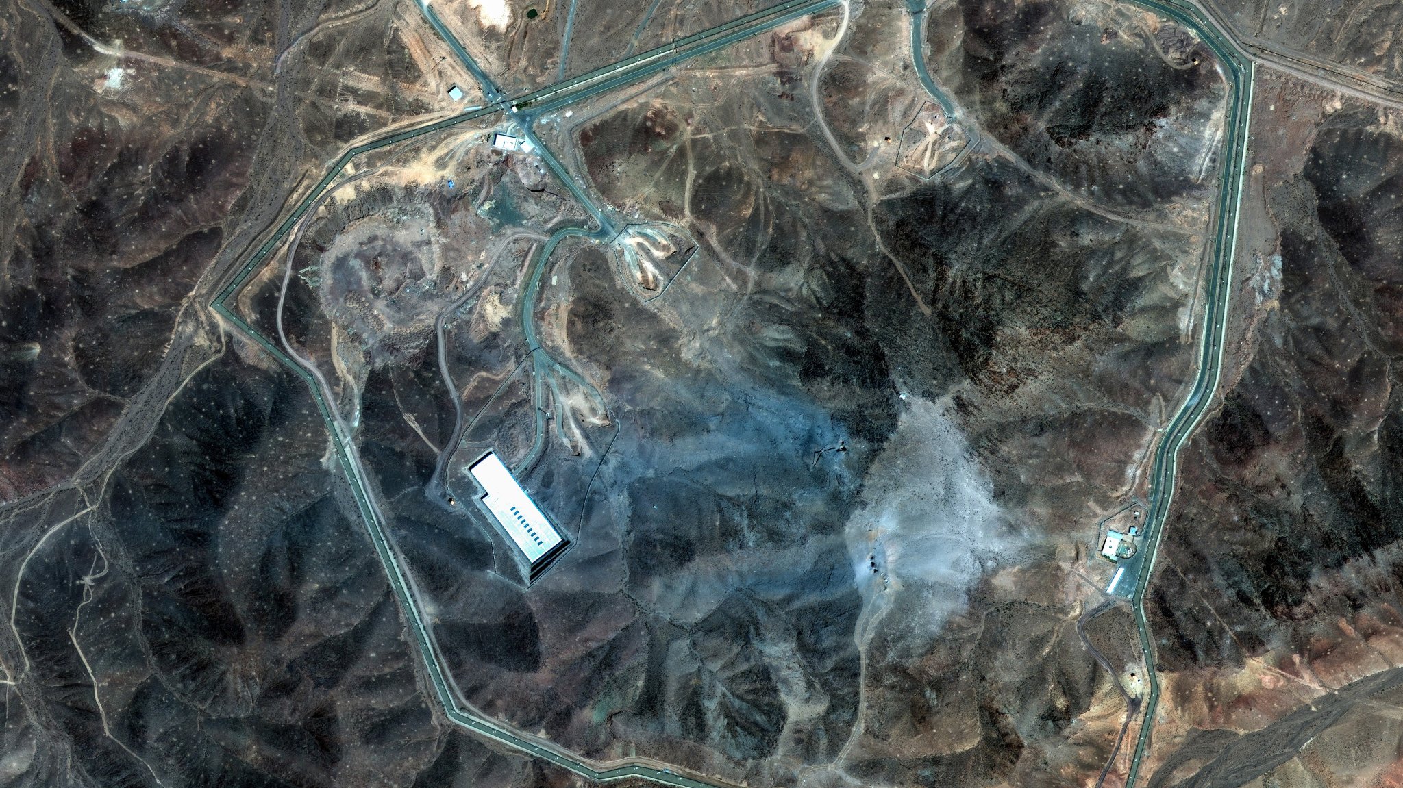 Satellite imagery showing the aftermath of US strikes on the Fordow nuclear enrichment site in Iran on June 22, 2025.